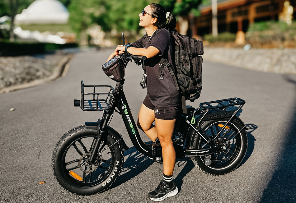 Woman with a Sawadeebike Buddy Bike electric bicycle at Bang Wad Reservoir in Phuket